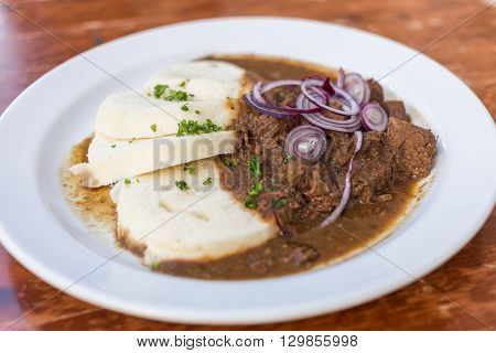 Typical serving of Beef Goulash and Bread Dumplings