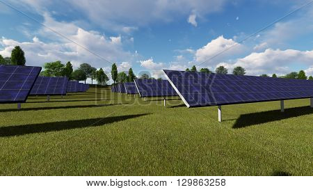 Solar panels on a green field on a background of blue sky with clouds