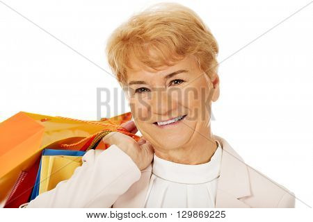 Happy business woman holging shopping bags