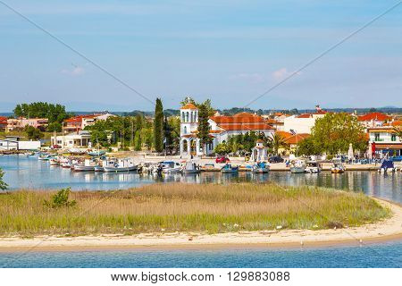 Keramoti, Greece - May 1, 2016: Keramoti church and port, town view with ferry boat going to Thassos island