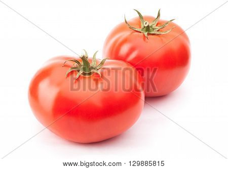 Two red tomatoes isolated on the white background with clipping path