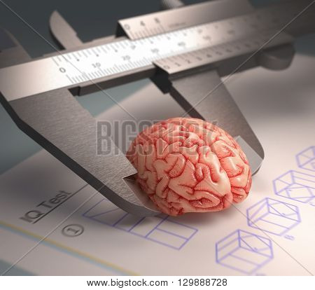 Caliper ruler measuring a human brain. Over the table a IQ Test in a concept of the human intelligence.