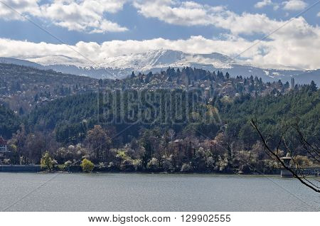 Look toward environment of springtime picturesque  dam, Plana and winter Vitosha, Pancharevo, Bulgaria