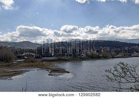 Look toward environment of springtime picturesque  dam, Plana and winter Vitosha, Pancharevo, Bulgaria