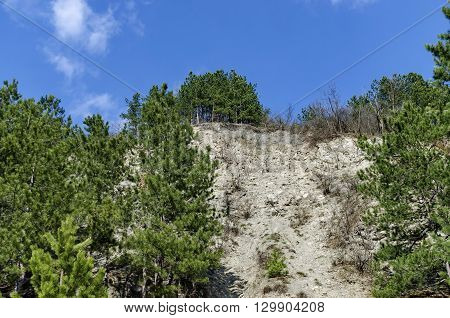 Mountainside of Lozen mountain with talus and forest at the top, Pancharevo, Bulgaria