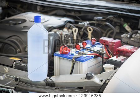 car battery maintenace with distilled water, garage