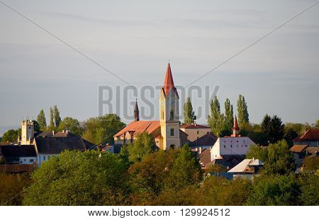 Mseno town with church in morning and evening