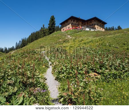 SCHROECKEN AUSTRIA JUNE 30: A view of Berghotel Koerbersee at the top of hill near village Schroecken in Bregenzerwald region Vorarlberg in Austria 2015.
