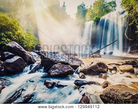 Vintage retro effect filtered hipster style image of tropical waterfall Phnom Kulen, Cambodia