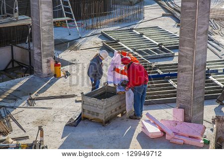 People Are Watching The  Plan At The Building Site