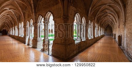 Santarem, Portugal. September 10, 2015: Cloister corridors of the Sao Francisco Convent. 13th century Mendicant Gothic Architecture. Franciscan Religious Order.