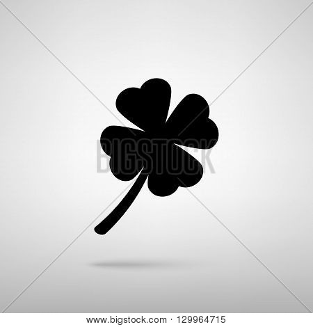 Leaf clover sign. Black with shadow on gray.