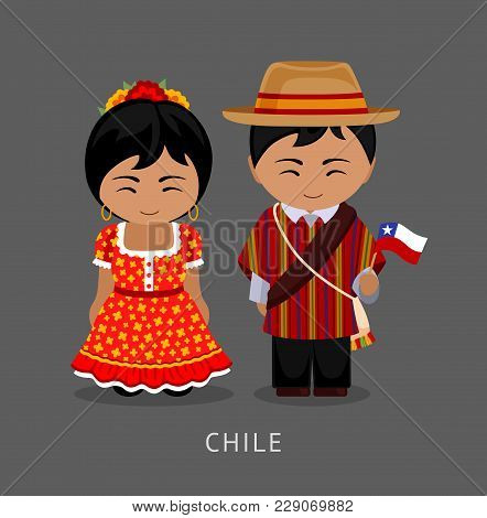 Chileans In National Dress With A Flag. Man And Woman In Traditional Costume. Travel To Chile. Peopl