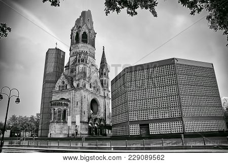The Protestant Kaiser William Memorial Church In The Centre Of The Breitscheidplatz. The Original Ch