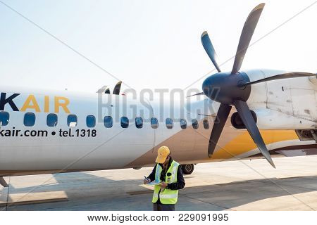 The Airplane Engineer Of Nok Air Flight Is Checking The Plane Before Leaving, Aircraft Name Is Bomba