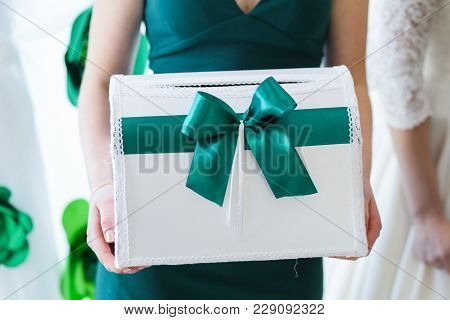 Wedding Box For Storing Money In The Hands Of A Female Witness