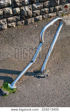 Metal Roadblock Completely Crashed And Crooked In The Street