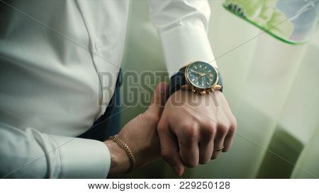 Closeup Designer Watch On Businessman Hand. Clip. Hand Of Businessman With A Clock.
