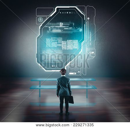 Businessman Working Of A Wall With A Toch Screen. The Concept Of Working On A Network