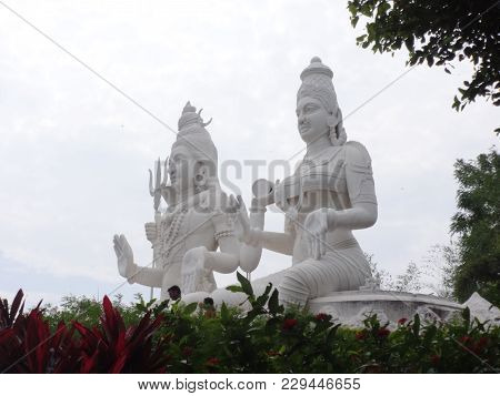 Side View Of Lord Shiva & Parvati Statue .