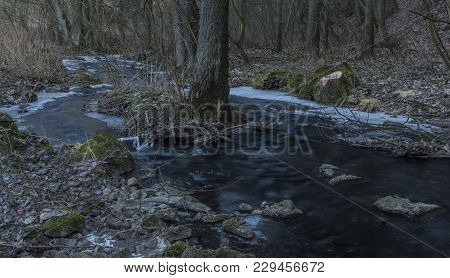 Milesovsky Creek In Oparno Valley In Winter Evening
