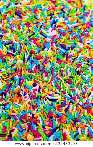 Sticks Of Sweet Colored Sugar On A White Background. Selective Focus.