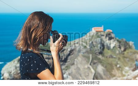 Tourist Traveler Photographer Making Pictures Sea Scape On Photo Camera On Background Ocean Gaztelug