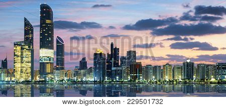 View Of Abu Dhabi Skyline At Sunset, United Arab Emirates