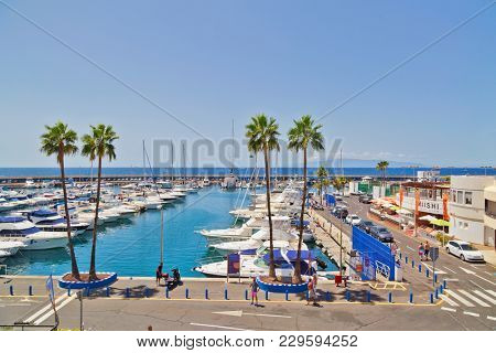 TENERIFE ISLAND, SPAIN - APRIL 10, 2017 :Marina with yachts near Colon beach on the Costa Adeje on Tenerife. Canary Islands. Spain