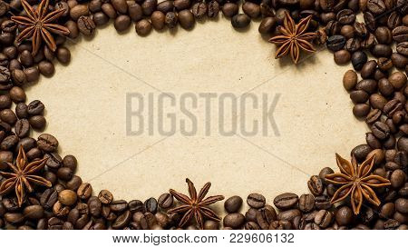 Coffee On Paper Background With Coffee Beans And Star Anise, Copy Space, Top View.
