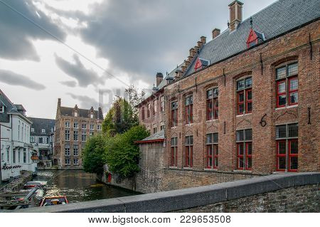 Bruges, Belgium - October 13, 2015: Scenic City View Of Bruges, Belgium, Canal Spiegelrei With Beaut