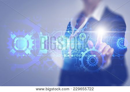 Businessman Women Toching The Screen Of The Mechanical Gear