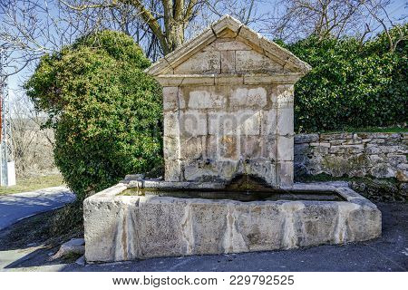 Public Fountain Of Palazuelos Stone In The Province Of Guadalajara, Spain