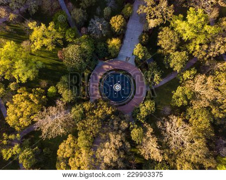 SAVANNAH, GEORGIA-MARCH 5, 2018: View of the historic fountain in Forsyth Park in Savannah, Georgia. The fountain was installed in 1858.