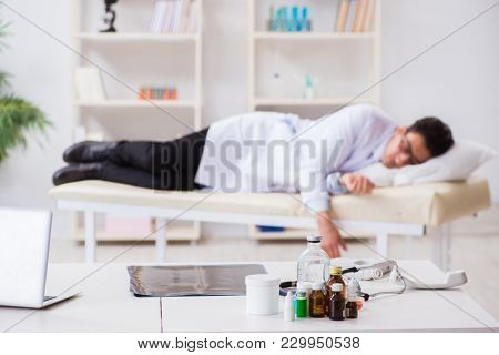 Doctor relaxing after complex surgery in hospital