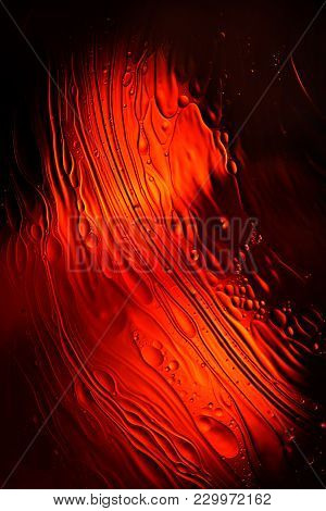 Mixing Water And Oil, Beautiful Color Abstract Background Based On Red And Yellow Circles And Ovals,