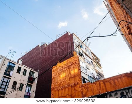 Barcelona, Spain - Nov 16 2017: Low Anlge View Of Barcelona Neighborhood Apartment Buildings With Di