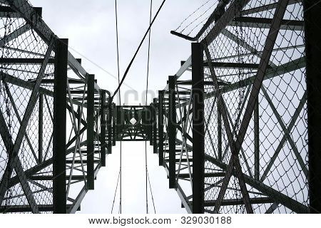 Steel Structural Pylon From Underneath With Cables And Cross Bracing