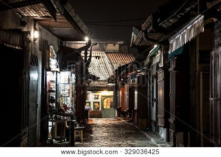 Sarajevo, Bosnia - April 15, 2017: Narrow Street Of Bascarsija District Of Sarajevo At Night, With M