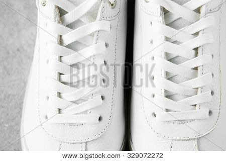 White Plimsolls Made Of Tumbled Leather, Matching Laces, Fabric Lining And Lightweight Platform Sole