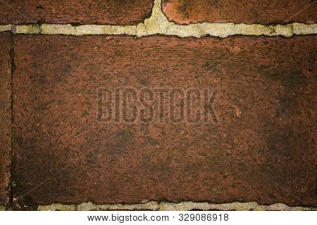 Background And Texture Of Baked Clay Brick  On Old Floor Surface