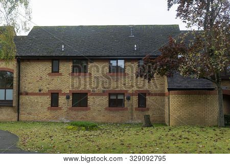 Oakham, United Kingdom. October 19, 2019 - English Traditional Orange Brick Wall Building.