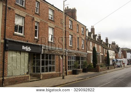 Oakham, United Kingdom. October 19, 2019 - English Traditional Orange Brick Wall Building.