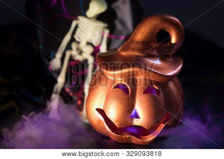 Helloween Pumpkin With Sceleton And Violet Smog