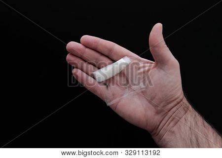 Sugar Is A Drug.sugar Packet In The Palm Of The Hand.like Cannabis.