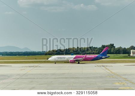 BUDAPEST, HUNGARY - SEPTEMBER 6, 2018: Wizzair A321 taxiing at Budapest Liszt Ferenc Airport. Budapest is one of Wizzair's most important bases.