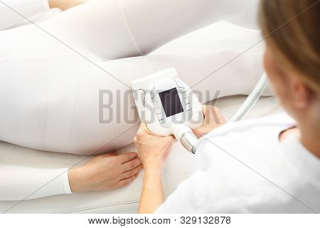 Endermology, Vacuum Massage Using The Head. Slimming Treatment For Thighs