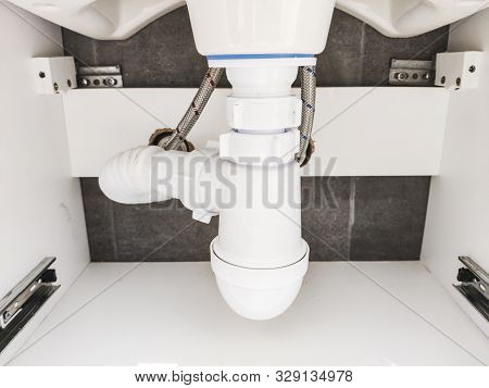 Basin Siphon Or Sink Drain In A Bathroom