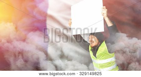 Protests Yellow Vests. A Young Man Is Holding A Poster. The Concept Of Revolution And Protest, The S