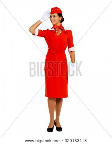 Full-length portrait of a young beautiful Russian stewardess in red uniform - isolated on white backgroundbackground